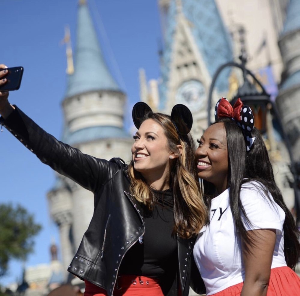 Patrice and Ginger Zee taking a selfie in front of Cinderella Castle at Walt Disney World